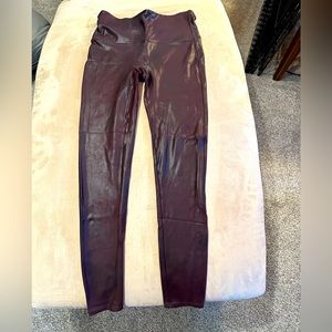 Wine colored faux leather Spanx leggings, size large